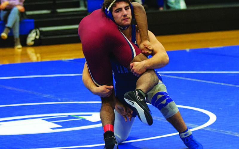 Daemian Rivas pinned his opponent to pick up his 50th career win as a Badger. HUNTER KING | DISPATCH RECORD
