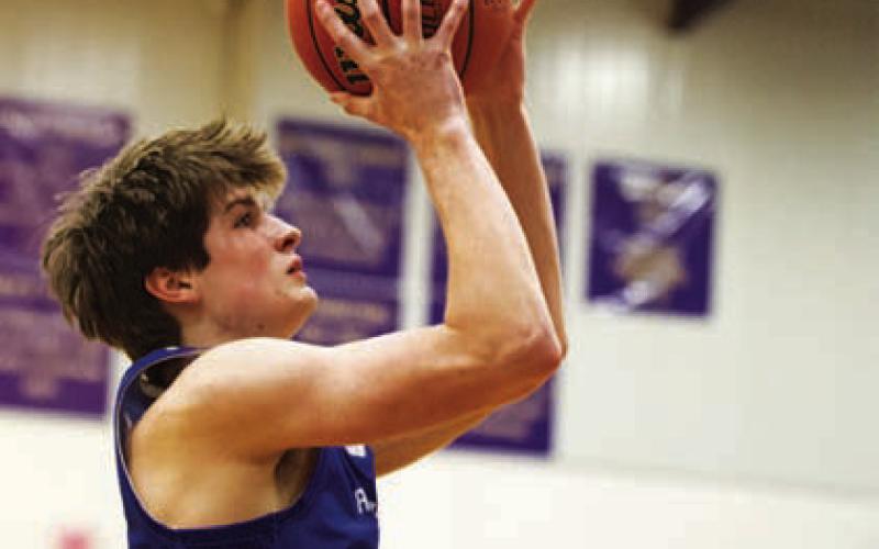 HUNTER KING | DISPATCH RECORD Calum Mitchell rises up for a shot.