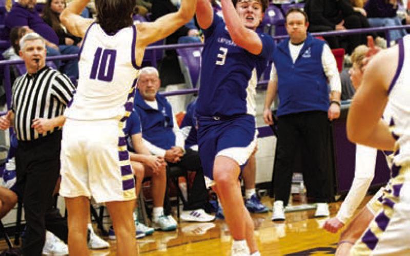 HUNTER KING | DISPATCH RECORD Aidan Nuckles makes a pass to a teammate.