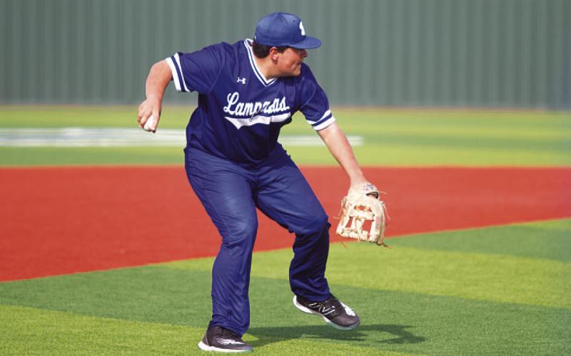 Benny Rodriguez sets to throw across the diamond for an out against Jarrell. HUNTER KING | DISPATCH RECORD