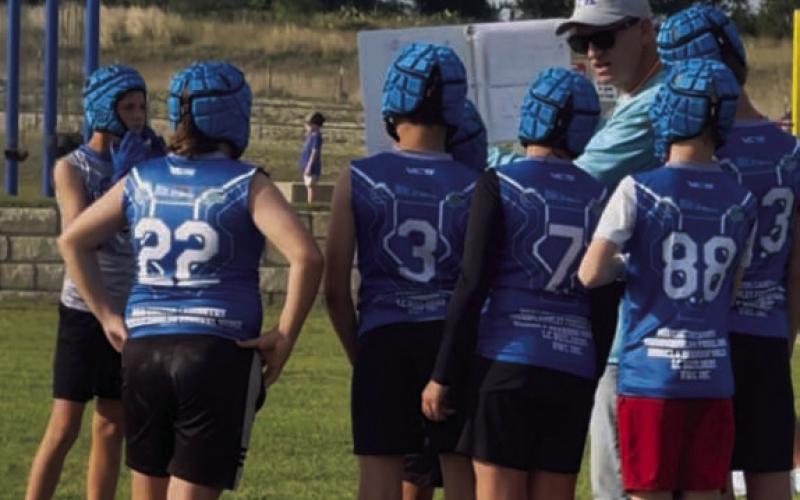 Joey McQueen coaches up some young Badgers. COURTESY PHOTO