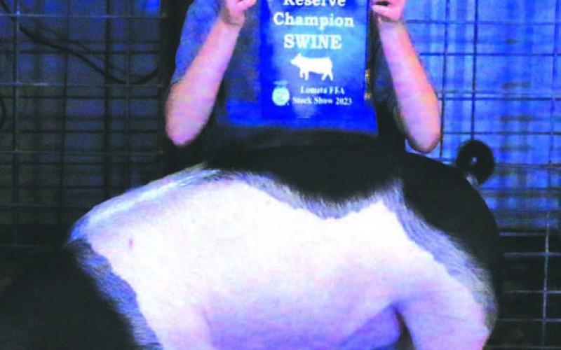Taelor Singleton exhibited the reserve champion swine during the 2023 show. MASON HINES | DISPATCH RECORD