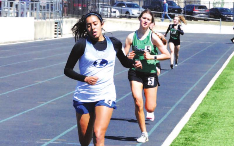 Leilany Alvarez runs down the final strectch during her 800-meter run last week. HUNTER KING | DISPATCH RECORD