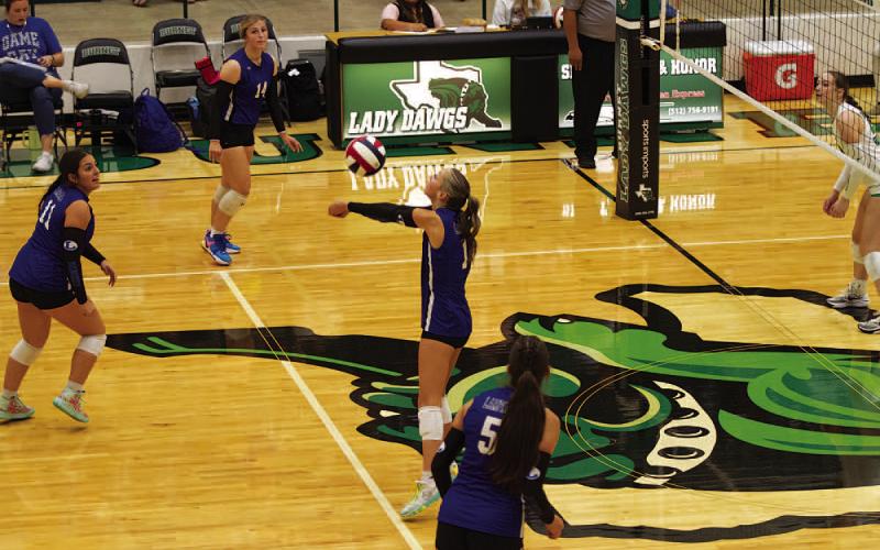 Brailey Wilson makes a pass to a teammate during an earlier match this season. HUNTER KING | DISPATCH RECORD