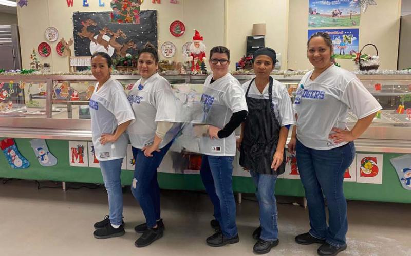The Taylor Creek Elementary School cafeteria crew and cafeteria manager JJ Johnstone take pride in preparing nutritious and delicious food for students and staff. One dish that is especially popular is the orange chicken. COURTESY PHOTO | TAYLOR CREEK ELEMENTARY