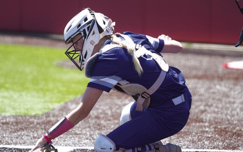 HUNTER KING | DISPATCH RECORD Kali Hunter digs out a low pitch during the first game of the bi-district series against Salado last Saturday.