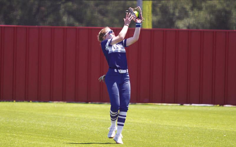 Aspen Wheeler drifts out to shallow center field to catch a pop fly. HUNTER KING | DISPATCH RECORD