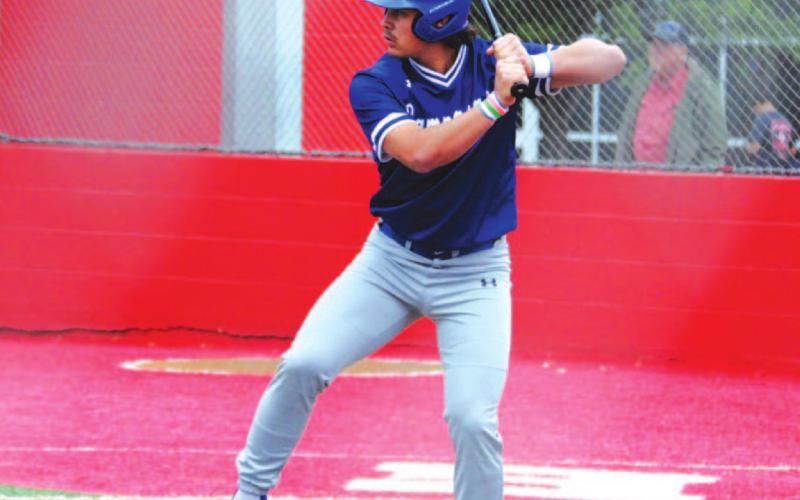 Tak Stinnett loads up to hit a pitch as he leads off for the Badgers against Glen Rose on Tuesday. HUNTER KING | DISPATCH RECORD
