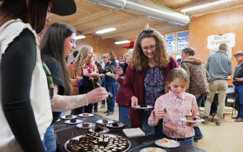 The dessert table was a popular stop for a sweet treat after dinner. ADAM BARRIOS | DISPATCH RECORD