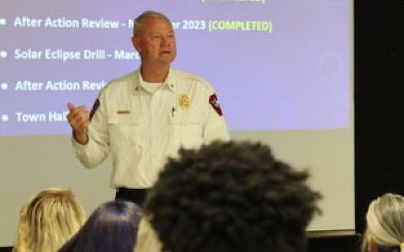 JOYCESARAH MCCABE | DISPATCH RECORD Lampasas Fire Chief Jeff Smith, who also serves as the city’s emergency coordinator, makes a presentation at a December town hall to update citizens about preparations for the total solar eclipse in April that is expected to bring thousands of travelers to town to view the event.