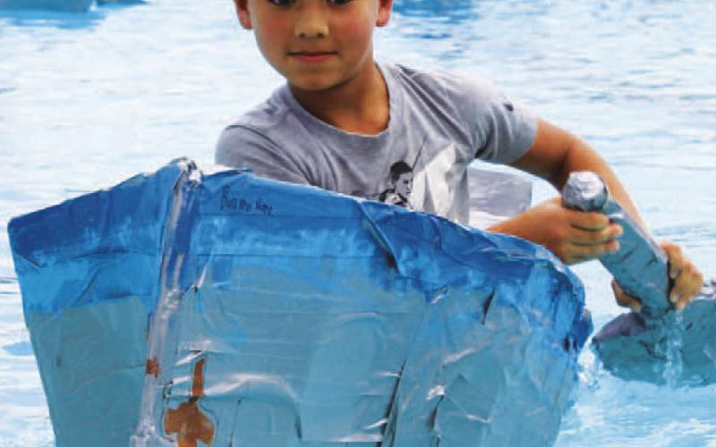 Zeke Gracia quickly rushes into the lead and finishes first in the solo 5–9-year-old regatta. CHLOE COWDREY | DISPATCH RECORD
