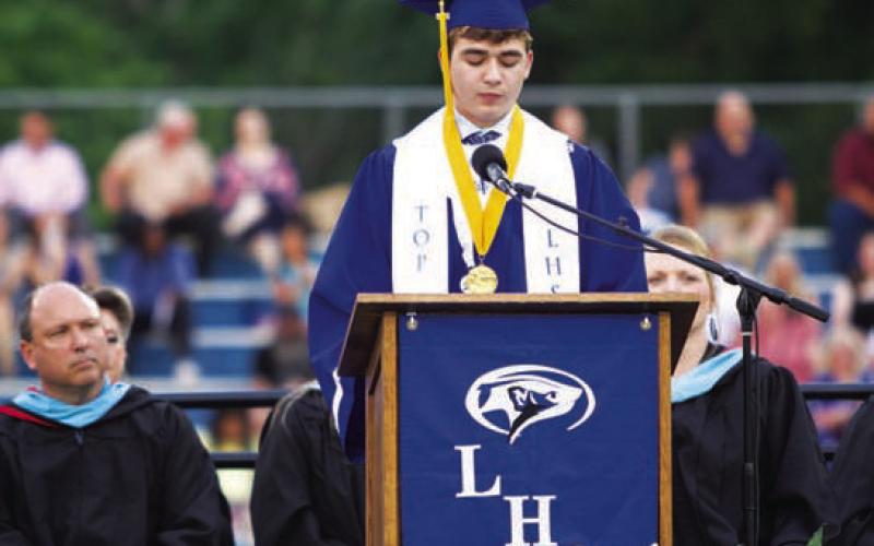 HUNTER KING | DISPATCH RECORD Salutatorian Jax Pratus gives his speech on Friday.