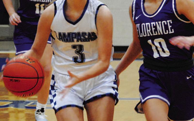 Jenna Ball looks up court to make a pass on a fast break. HUNTER KING | DISPATCH RECORD