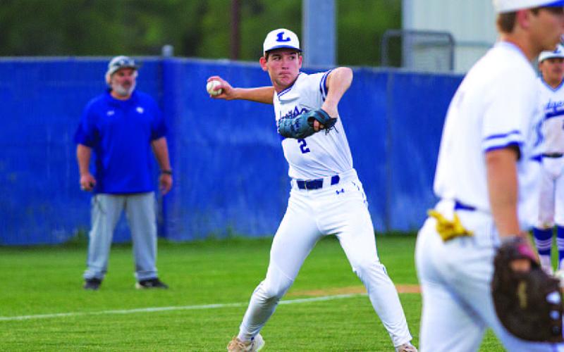 JT Posten fields a bunt and throws to first base for an out against Jarrell. HUNTER KING | DISPATCH RECORD