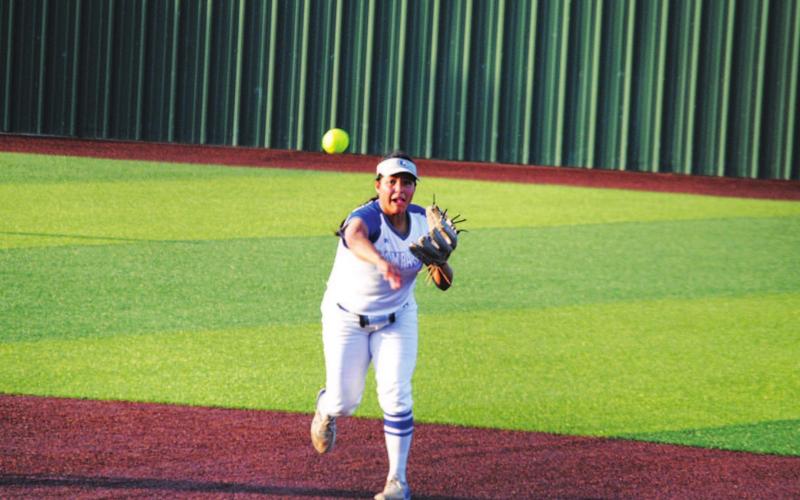 Mia Maldonado throws across the diamond from shortstop to record an out against Argyle last Friday. HUNTER KING | DISPATCH RECORD