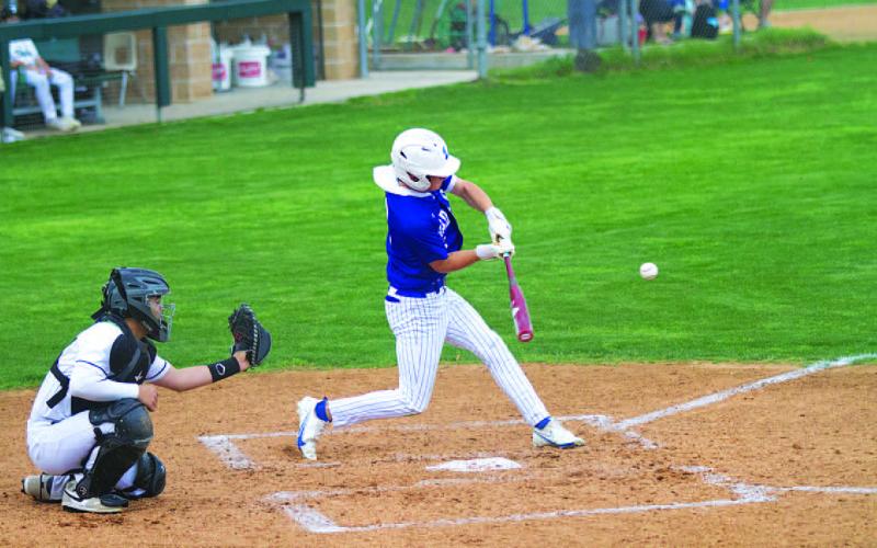 HUNTER KING | DISPATCH RECORD Cory White was a standout performer for the Badgers in their win over Taylor on Tuesday.
