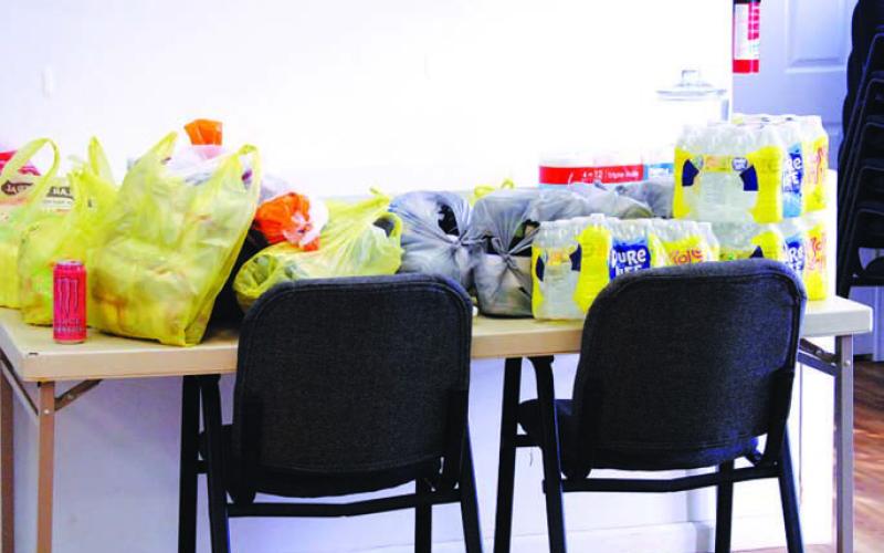 Sacks of food and water donated to Lampasas Community Church were on hand when the facility opened Thursday to those in need of a nourishing meal and a warm place to spend the night. JOYCESARAH MCCABE | DISPATCH RECORD