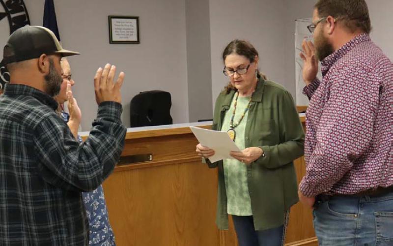 Municipal Judge Sharon Watson administers the oath of office to newly installed members of the Lometa City Council during the May 12 regular meeting at City Hall. Pictured from left are Alex Witherspoon, Karen Chism, Watson and Taylor Thompson. CHERI JAY-WIENECKE | DISPATCH RECORD