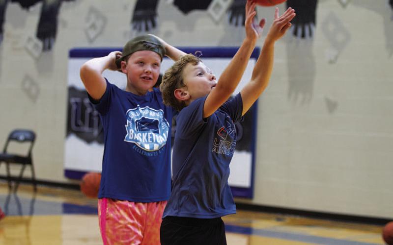 HUNTER KING | DISPATCH RECORD Ayson Nuckles shoots at basketball camp.