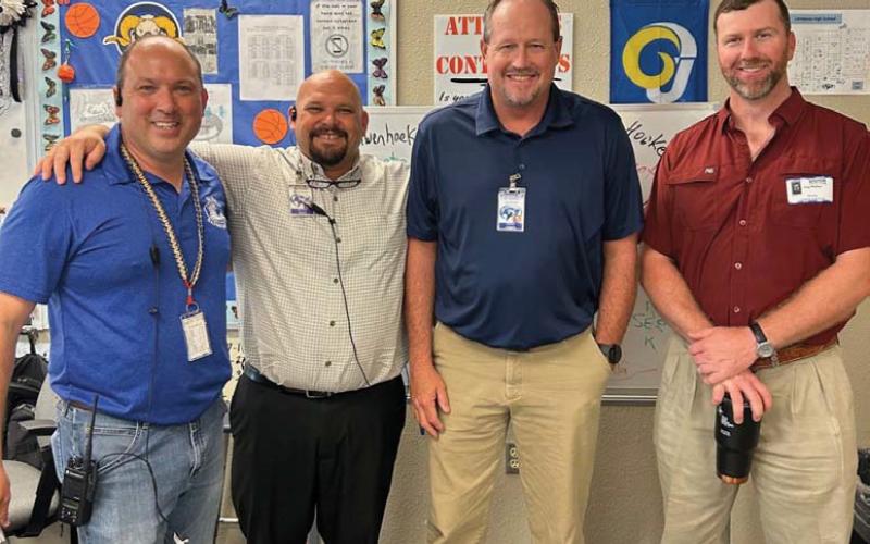 Also earning Teacher of the Month honors is Doug Messer, third from left. He is shown with Principal Paul Weinheimer, Assistant Principal Ryan Race and Clay Phillips of Texas Farm Bureau Insurance. “Messer is extremely positive and gives his all every day,” Race said. Also recognized but unavailable for a photo: Lori Hoersten, the September Substitute of the Month. Courtesy photo