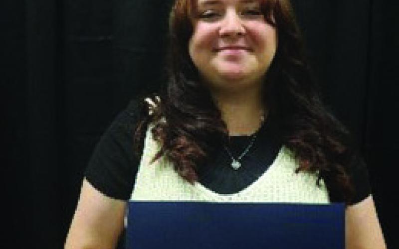 COURTESY PHOTO Jasen Sharp and Sara Hobson-Lusty were among 12 area 4-H members and 10 adult leaders honored Oct. 24 by the District 7 4-H Gold Star and Silver Clover Banquet.