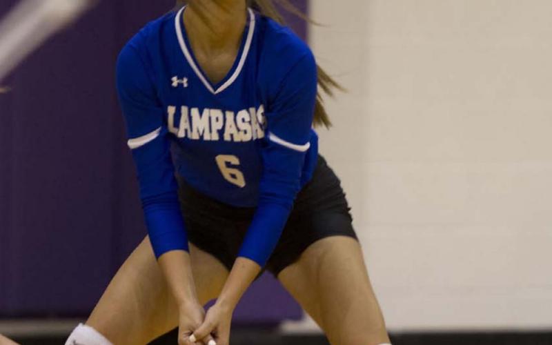 Kayli Syx prepares to complete a pass during a previous match against Florence. The Lady Badgers are set to play the Jarrell Cougars on Tuesday. HUNTER KING | DISPATCH RECORD