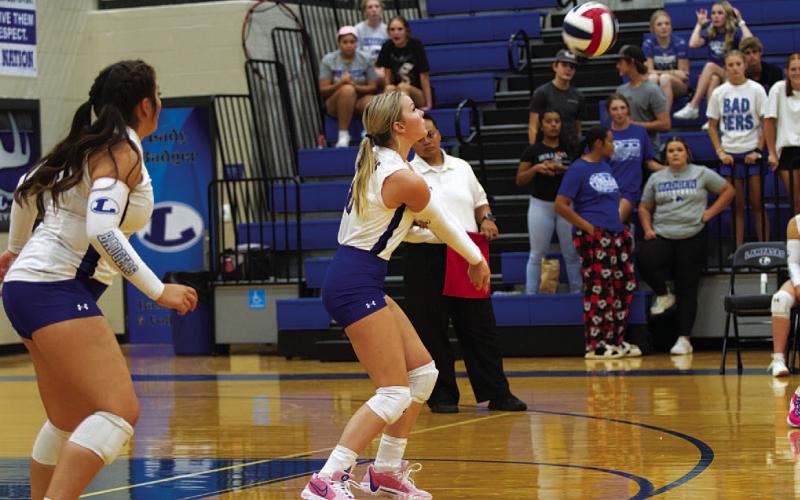 HUNTER KING | DISPATCH RECORD Scout Barton plays a pass during Tuesday’s match in the Badger Den.