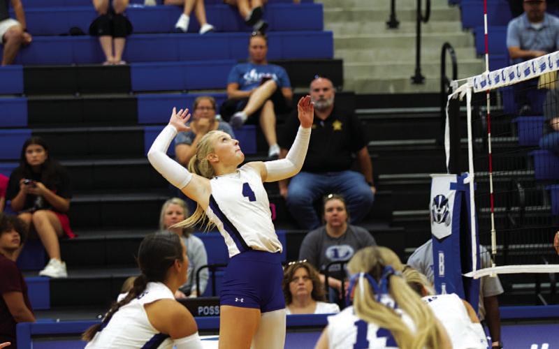 HUNTER KING | DISPATCH RECORD Brylie Turner rises for a kill during the Lady Badgers’ match against Brownwood.