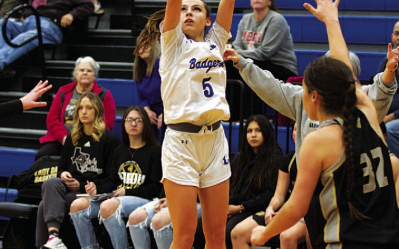 HUNTER KING | DISPATCH RECORD Chloe Thorp releases a three-point shot.