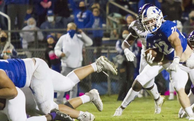 Rice University verbal commit John Long (79) pancakes an Austin LBJ Jaguar as Jack Jerome (22) rushes for a touchdown. Lampasas won 41-20 over LBJ, a state semifinalist team with two Power 5 Conference commits on the team. Jerome finished with about 4,000 career rushing yards. JEFF LOWE | DISPATCH RECORD