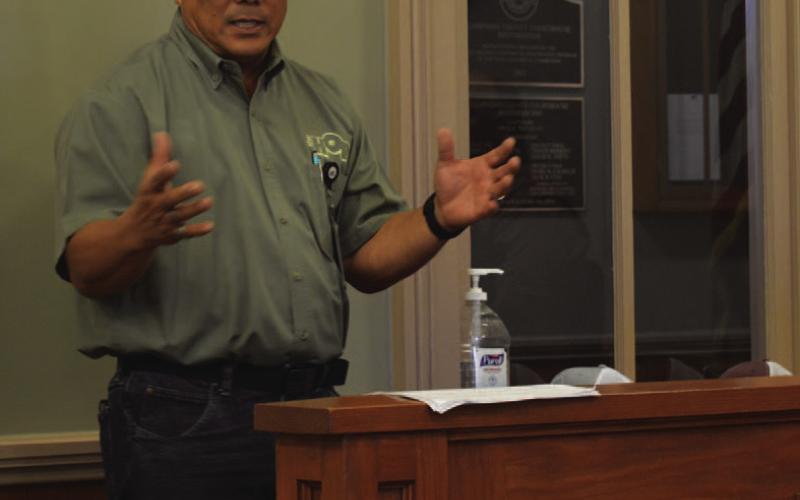 Tony Austin, the HOP director of Public Engagement, outlines for the Commissioners Court the various transit options that will be available to county residents. ERICK MITCHELL | DISPATCH RECORD