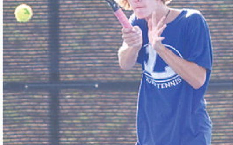 Luke Rogers won his doubles match with Messinger on Tuesday. The senior is in his final season with the Badgers. HUNTER KING | DISPATCH RECORD