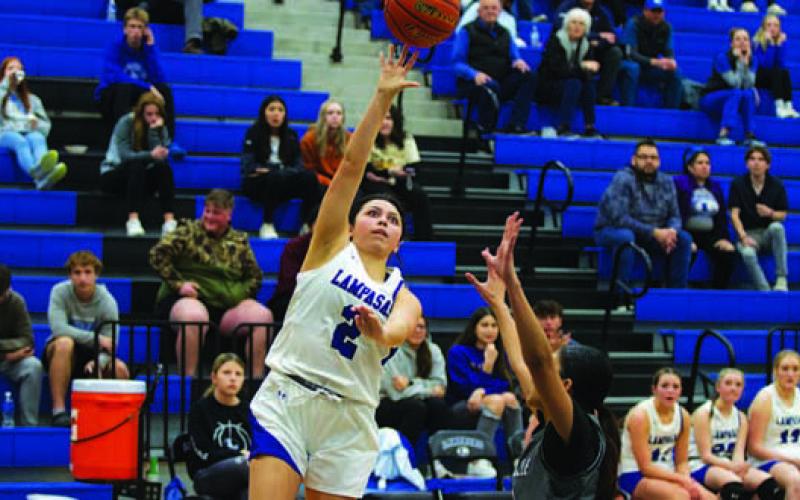 Johnnie Lewis shoots over a Gatesville defender. HUNTER KING | DISPATCH RECORD