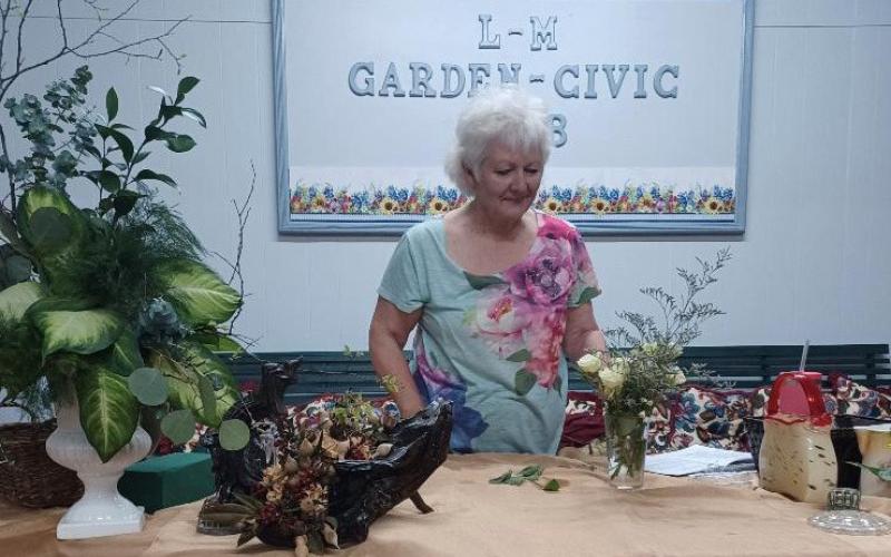 courtesy photo Donna McKinney brought sample flower arrangements to illustrate various design principles when she spoke to members of the L-M Garden &amp;amp; Civic Club at the monthly meeting.