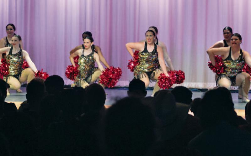 ERICK MITCHELL | DISPATCH RECORD The Flames perform their “Barbie” routine during a Winder Wonderland performance Dec. 8.