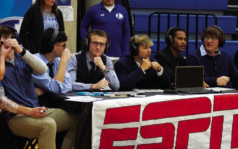 A group of Badger student athletes set up their own ESPN broadcast for the game. HUNTER KING | DISPATCH RECORD