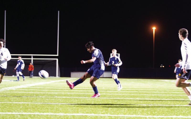 HUNTER KING | DISPATCH RECORD David Flores takes a shot on net during last week’s match.