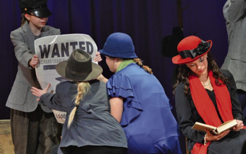 Lampasas Middle School students perform a scene from “The 39 Steps Even More Abridged” during their UIL One-Act Play rehearsal last Friday evening. ERICK MITCHELL | DISPATCH RECORD