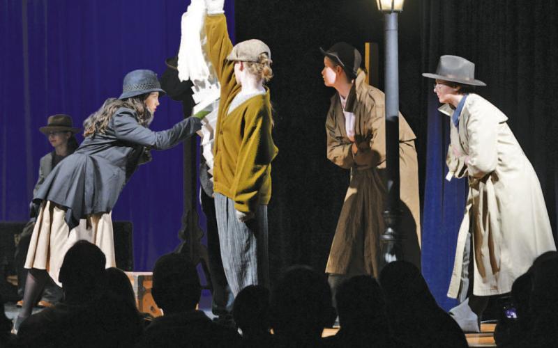 A scene from “The 39 Steps Even More Abridged” is performed by Lampasas Middle School theater students. ERICK MITCHELL | DISPATCH RECORD