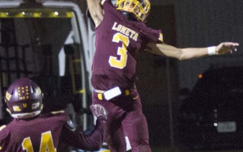 Lometa Hornet Alonso Caso (3) deflects a pass last year. The Hornets are expected to bring back four starters on each side of the ball from last year’s 7-3 team. FILE PHOTO