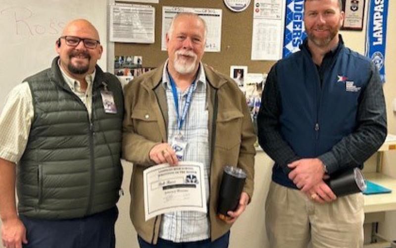 Substitute of the Month for January was Bob Ross, center. Recognizing Ross for filling in at various positions across the high school campus are Assistant Principal Ryan Race, left, and Clay Phillips of Texas Farm Bureau Insurance. Courtesy photo