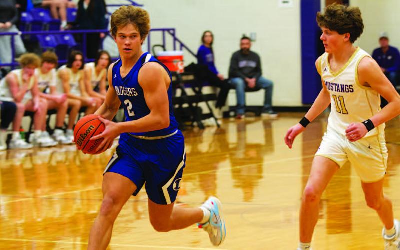 Haegan Oncken looks to pass to a teammate on the fast break against Marble Falls. HUNTER KING | DISPATCH RECORD