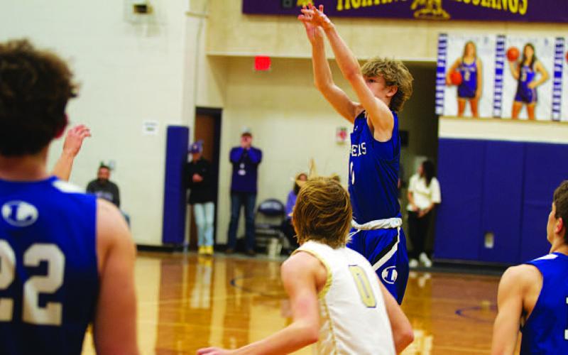 Peyton Sisson pulls up for three on Friday against the Mustangs. HUNTER KING | DISPATCH RECORD