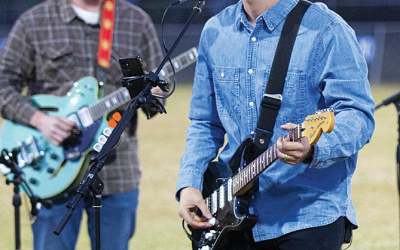 John Groves of Lampasas Methodist Church sings worship music during Fields of Faith last Wednesday. hunter king | Ldispatch record