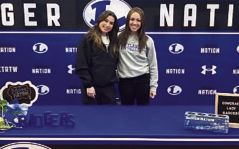 Gracey Ullevig, left, and Hannah Perry both signed last Friday to continue their athletic careers at the college level. Ullevig will be playing volleyball at Temple College, and Perry is going to play softball at Wayland Baptist University. COURTESY PHOTO