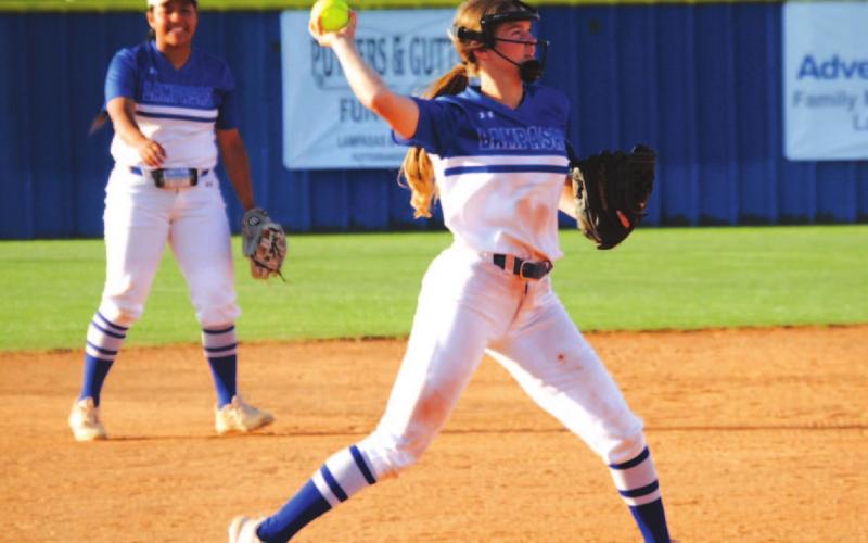 Hadley Oncken throws across to first for an out in the first inning of the Stephenville game. HUNTER KING | DISPATCH RECORD