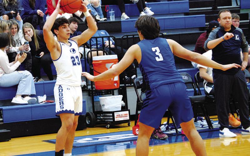 Ethan Moreno looks for a teammate to pass to during Tuesday’s contest. HUNTER KING | DISPATCH RECORD
