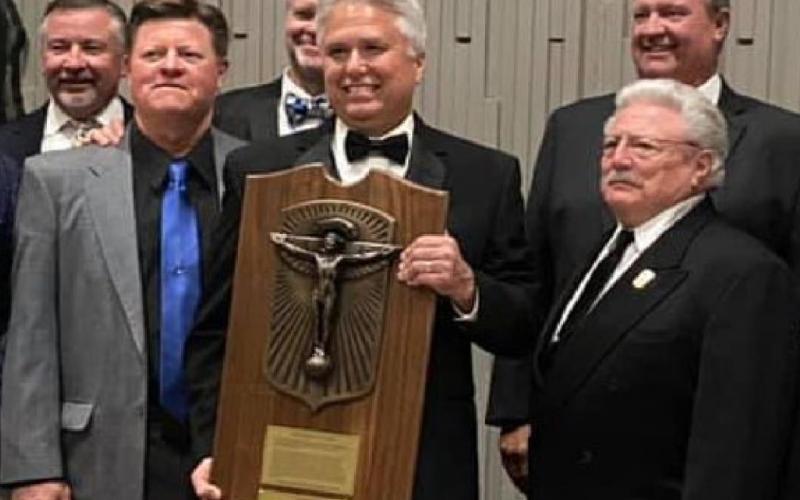 Craig Benton of Lampasas is shown holding the Keeler Plaque. COURTESY PHOTO