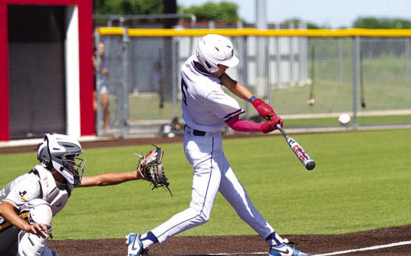 Kade Landry swings and drives the ball to right field for the walk-off win. HUNTER KING | DISPATCH RECORD