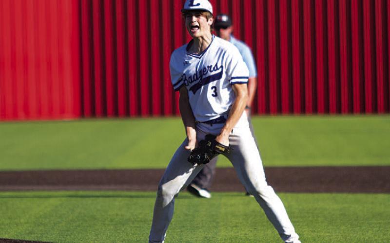 Calum Mitchell screams after recording the final out of the series. HUNTER KING | DISPATCH RECORD